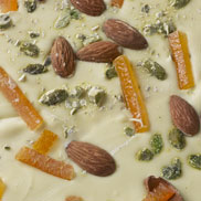 white chocolate with almonds pistachios and oranges