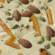 Chocolat blanc aux amandes pistaches et oranges confites